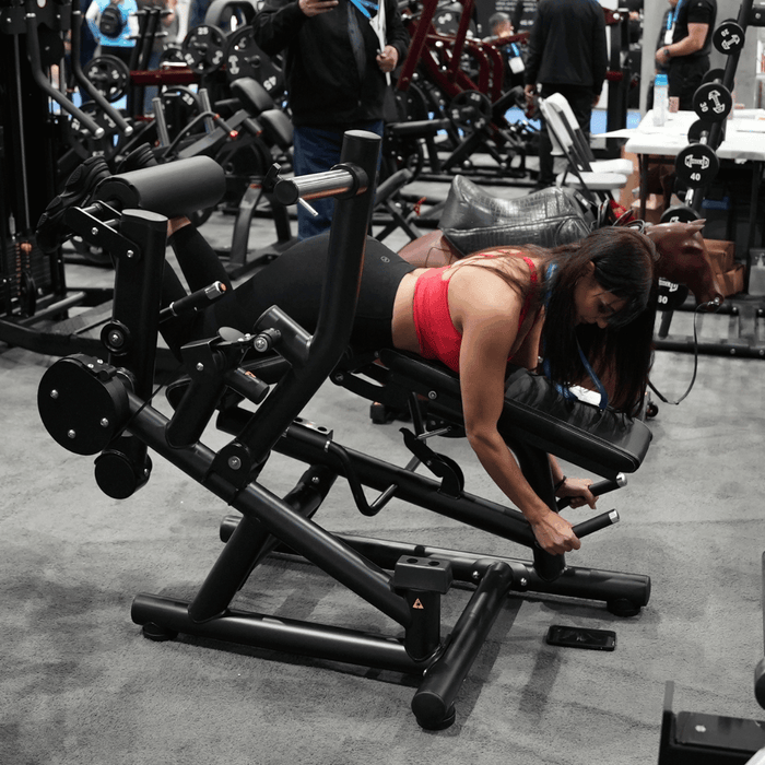 Pro Strength Leg Extension / Prone Leg Curl Combo - Muscle D Fitness - Plate Loaded Quad & Hamstring Machine - Sweatfully