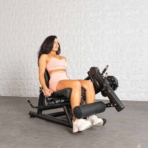 Pro Strength Leg Extension / Prone Leg Curl Combo - Muscle D Fitness - Plate Loaded Quad & Hamstring Machine - Sweatfully