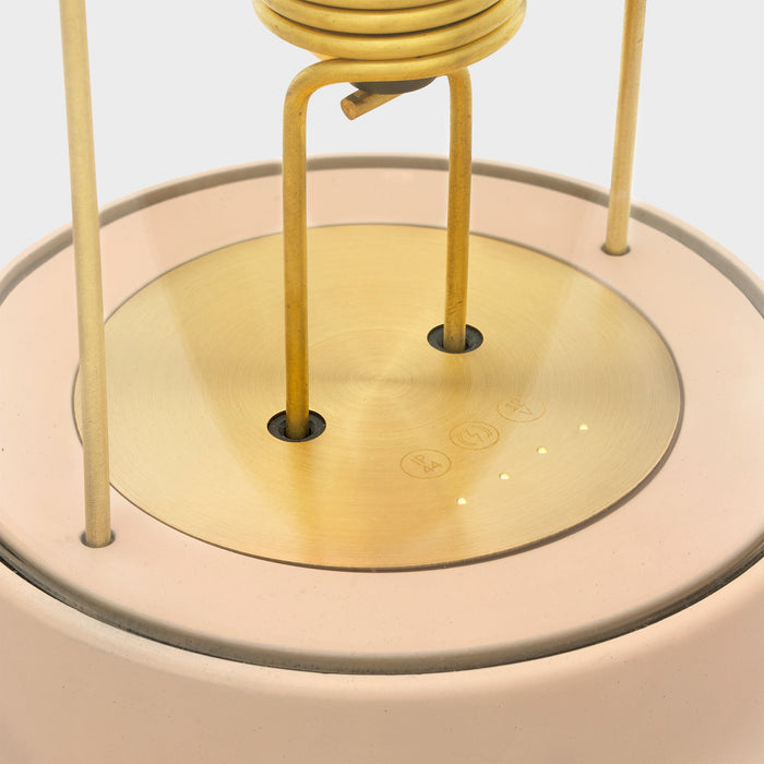 The Muse Portable Lamp in Setting Plaster Pink - Sweatfully