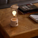 The Muse Portable Lamp in Setting Plaster Pink - Sweatfully