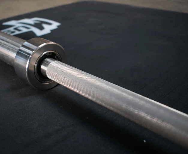7' Stainless Steel Bushing Olympic Bar and Bumper Plate Set - Sweatfully