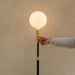 Poise Adjustable Floor Lamp in Brass - Sweatfully